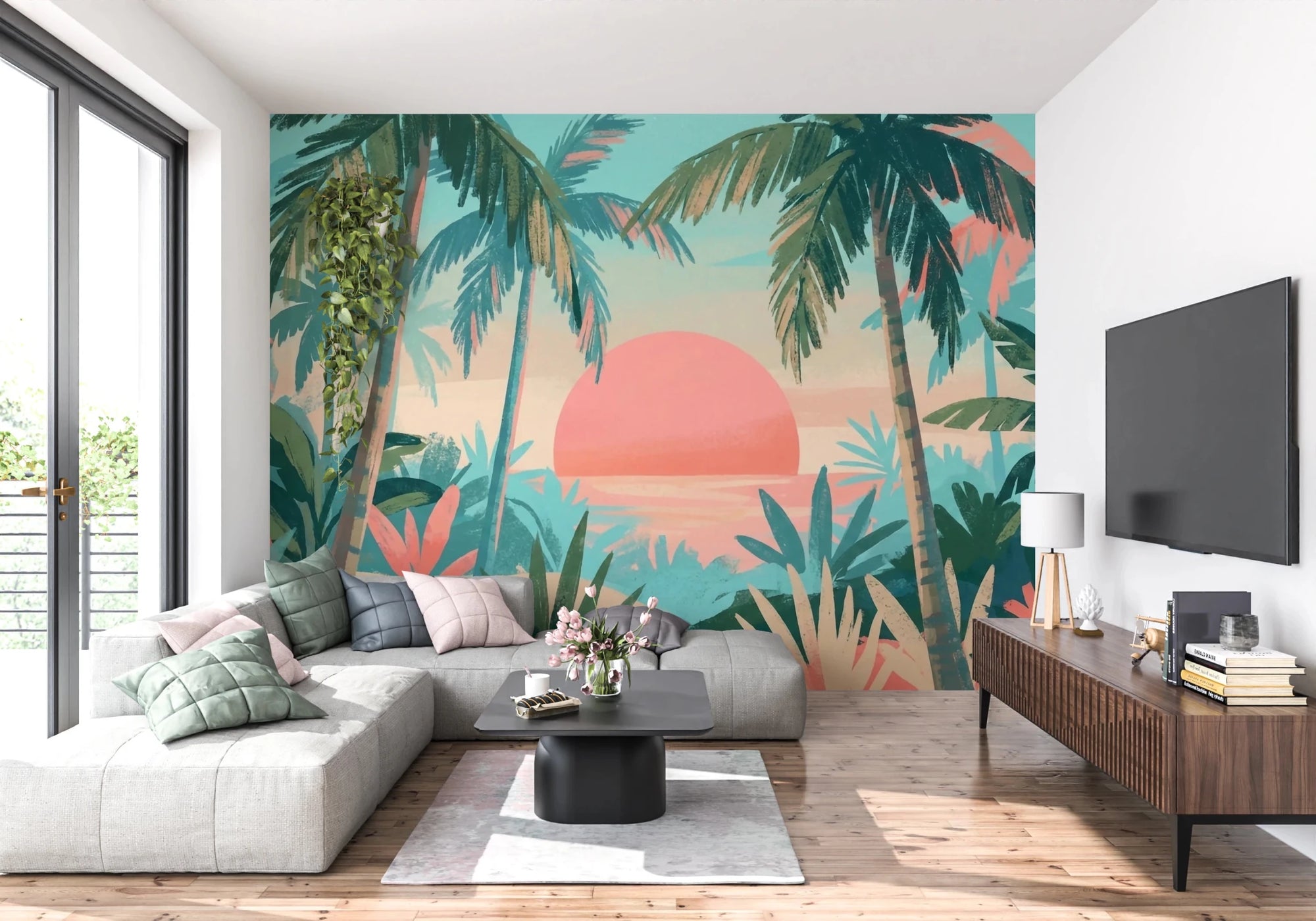 Tropical Calm mural of a pink sunset and palm trees behind a grey sectional sofa and wood media console