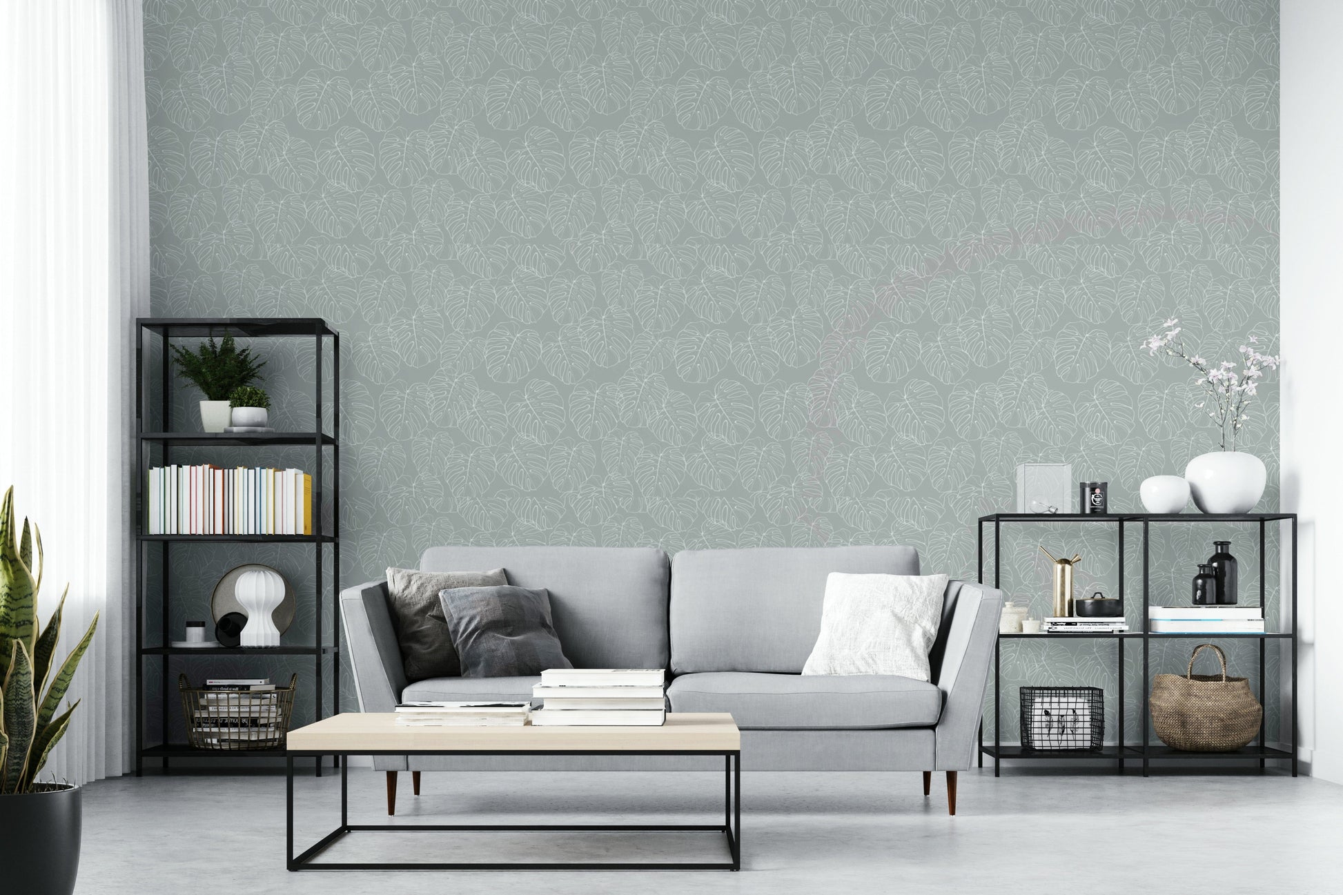 The design features a repeating pattern of soft, delicate tropical leaves.

