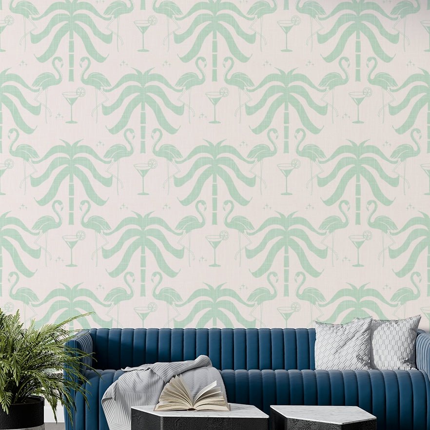 The image shows a peaceful, natural scene with palm trees and flamingos.

