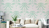 The palm trees and flamingos are a central focus of the image.

