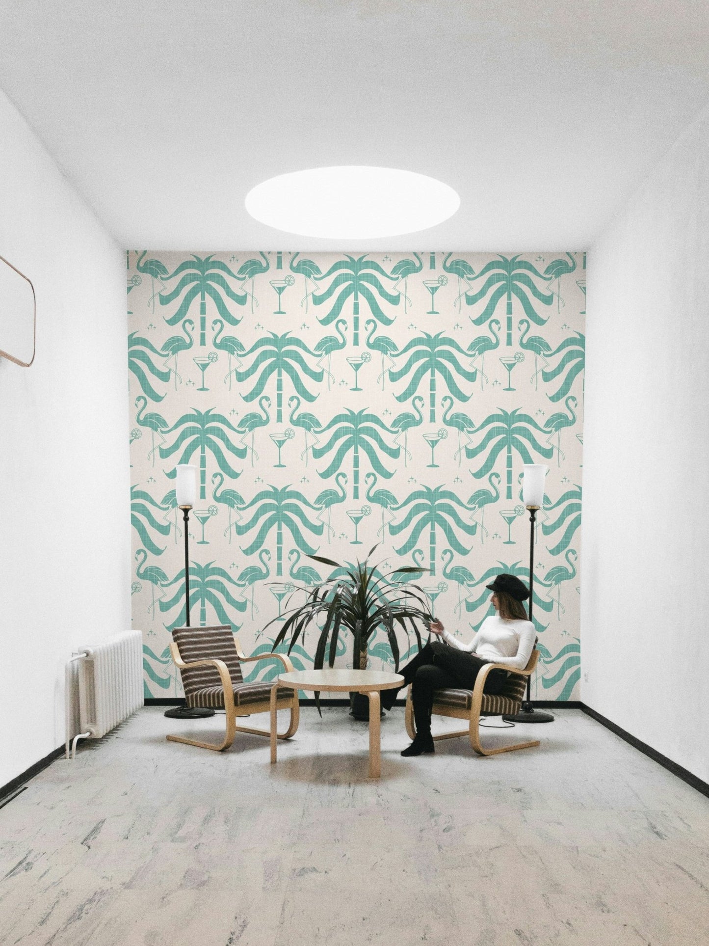 The palm trees and flamingos are a central focus of the image.

