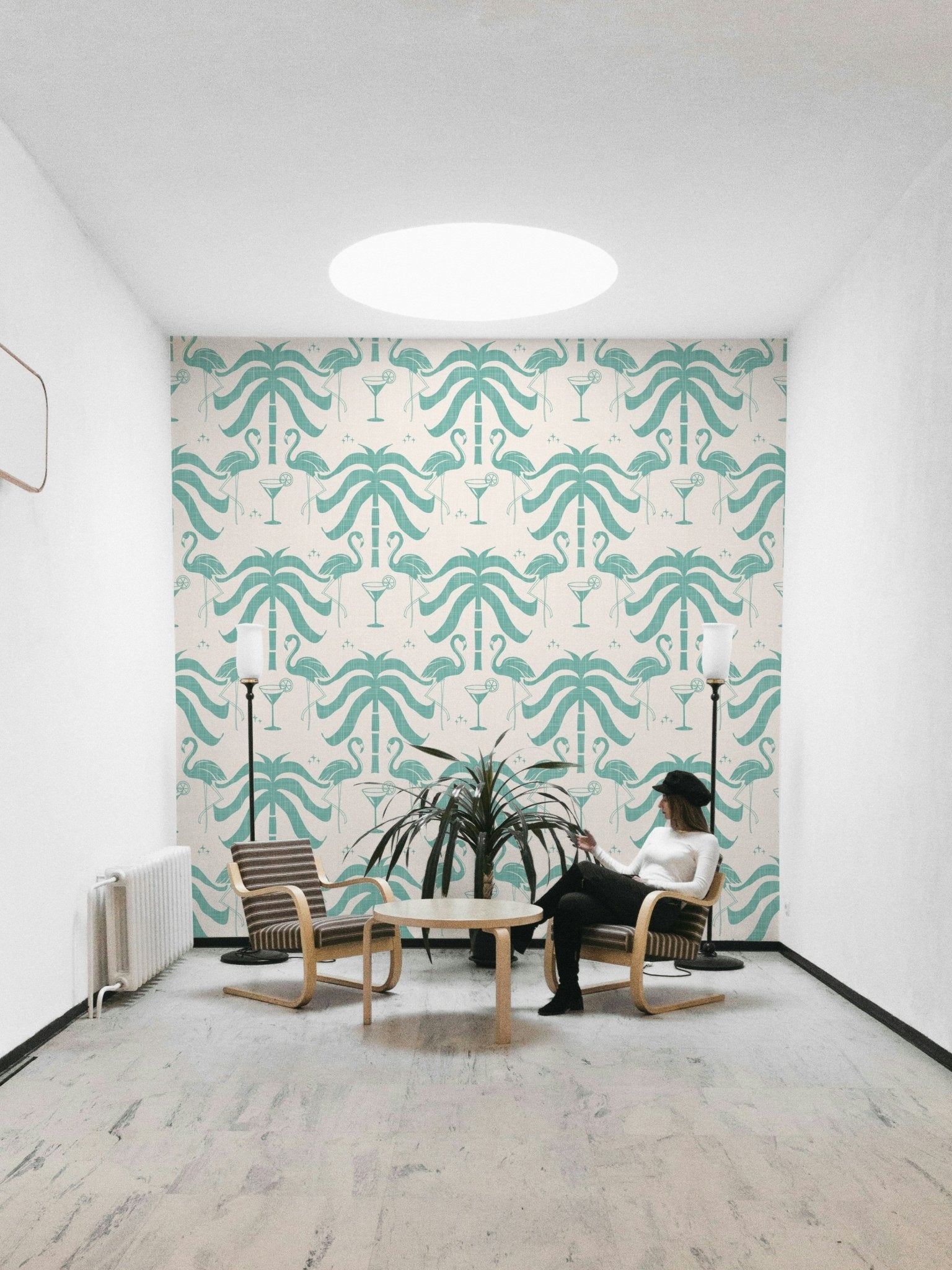 The palm trees and flamingos are a central focus of the image.


