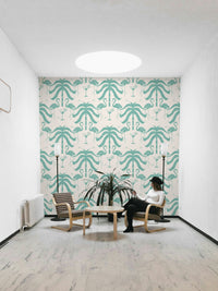The palm trees and flamingos are a central focus of the image.

