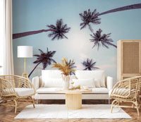 Bright daylight highlights the Tropical Palms Sky View Wall Mural foliage.