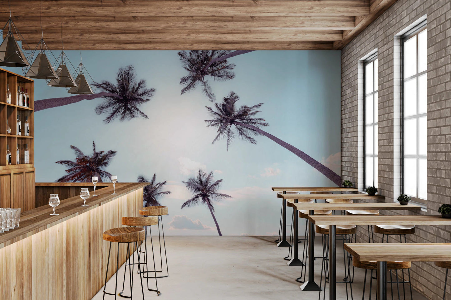 Tall tree trunks meet in the center of the Tropical Palms Sky View Wall Mural.