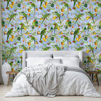 Tropical mural with birds perched on leafy branches.

