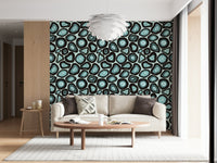 A patterned wallpaper with turquoise geode-style forms outlined in deep, earthy rings.