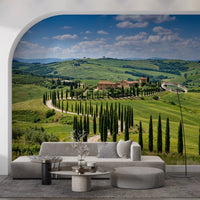Living room with Tuscan cypress wall mural and rolling countryside view