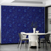 The mural is created for an entire wall, providing a sophisticated backdrop.
