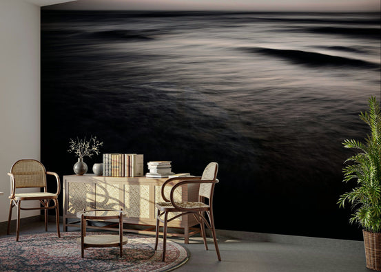 A graceful subtle gradient wall mural in cool, dark tones.

