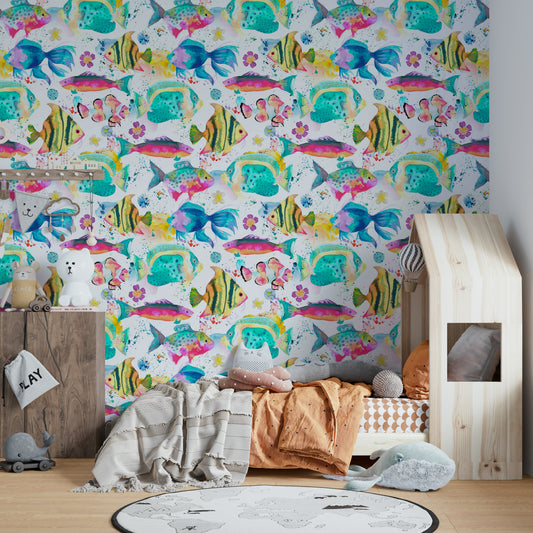 Underwater mural with pink tones and watercolor marine life.

