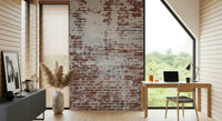 Textured mural with aged and deteriorated brickwork creating depth and character in living spaces.