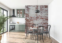 Textured wall mural with worn and aged brick patterns creating a gritty, urban accent wall.