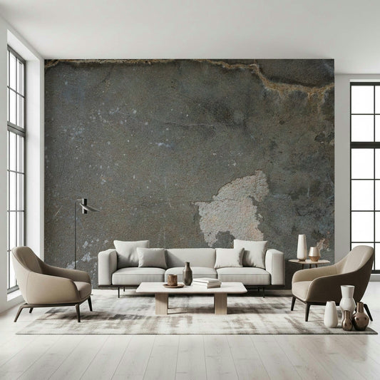 Urban Gray Industrial wallpaper mural in charcoal concrete behind a gray sofa and two taupe armchairs