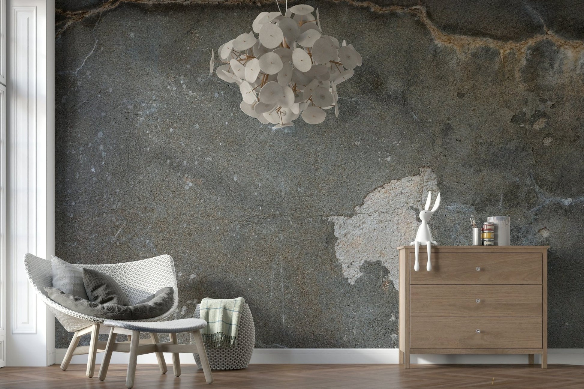Urban Gray Industrial wallpaper mural in gray concrete behind a white woven lounge chair and wood dresser
