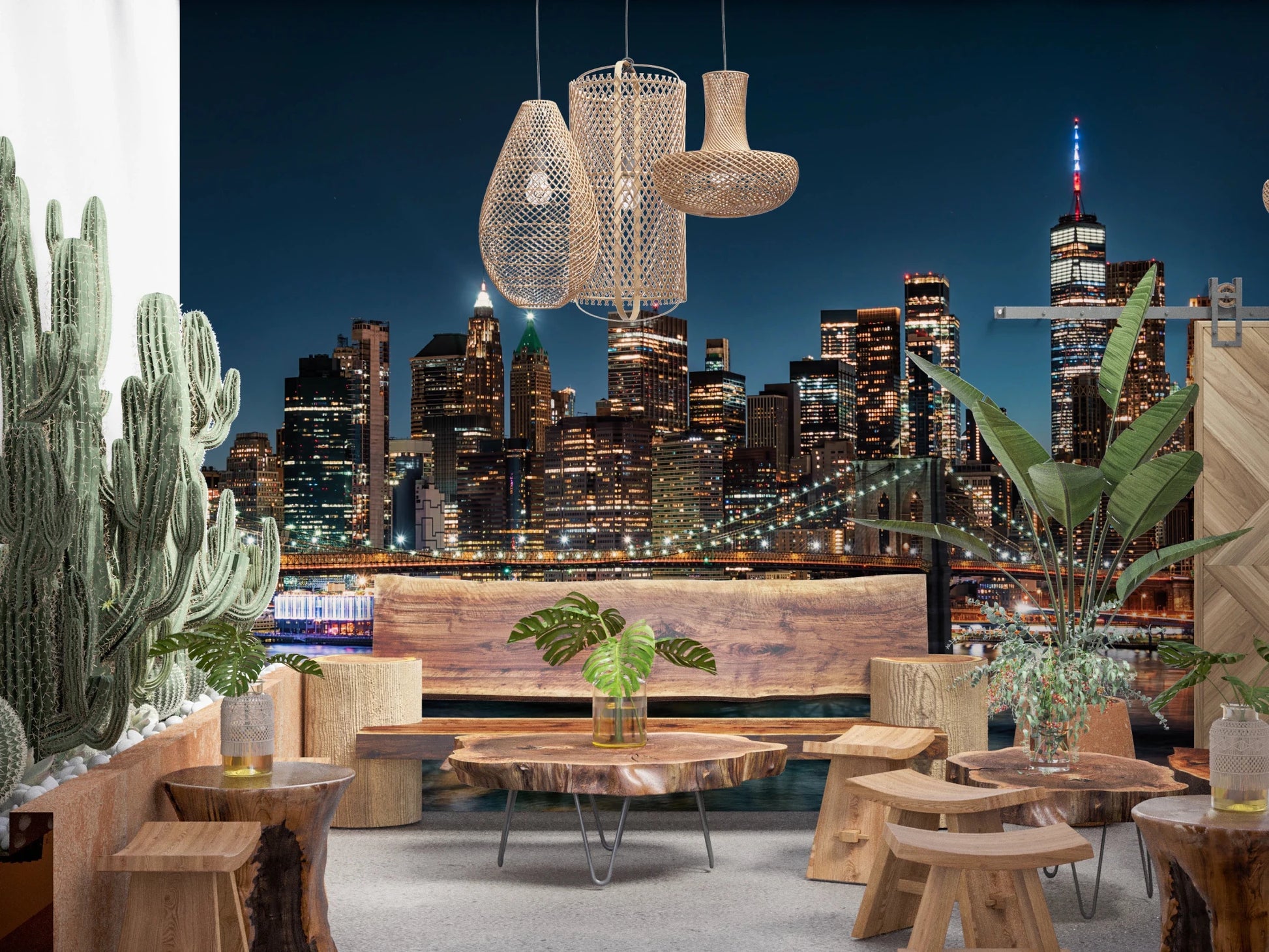 Urban Nightscape wallpaper mural of a night skyline behind tall cactus plants and rustic wood furniture