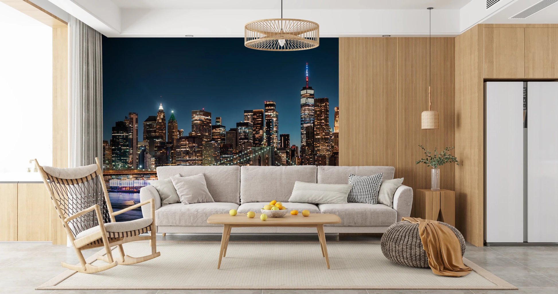 Urban Nightscape wallpaper mural on a wood-panel living room wall above a grey sofa and rattan pendant light
