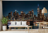Urban Nightscape wallpaper mural of a city skyline and bridge above a bench and dining table by a window