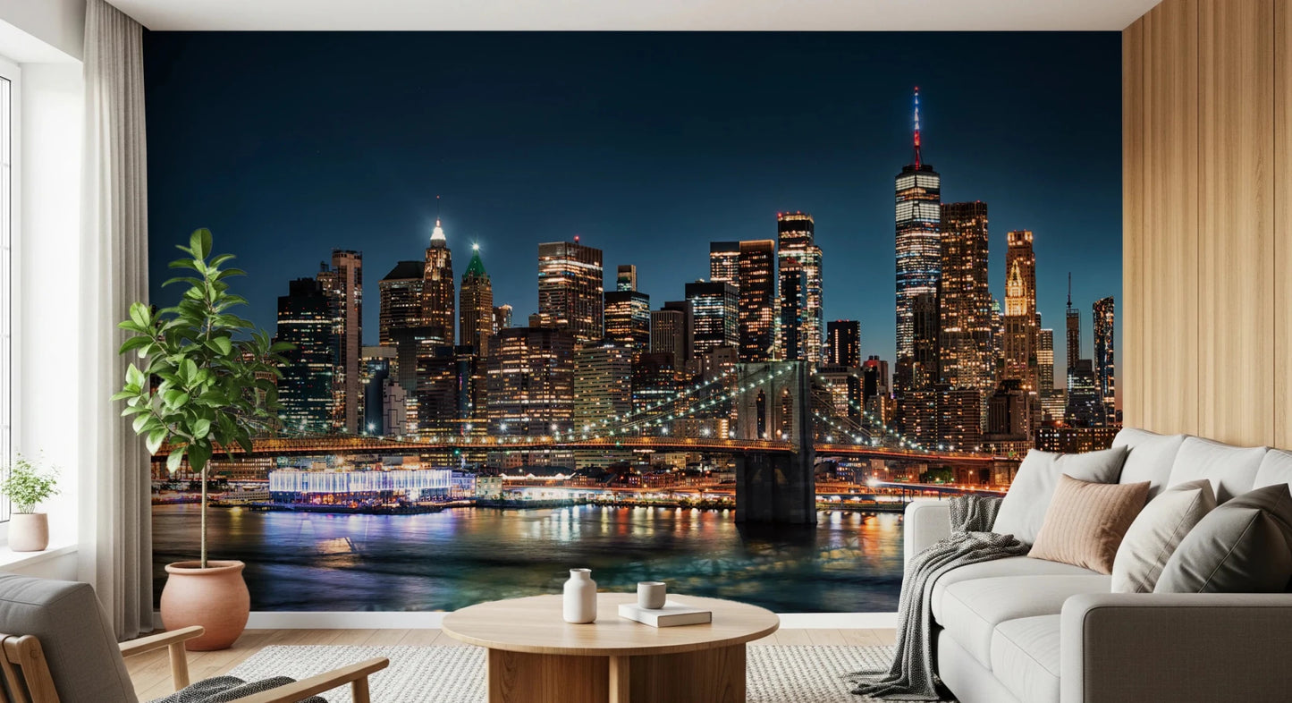 Urban Nightscape wallpaper mural of a glowing skyline and bridge beside a white sofa and potted plant