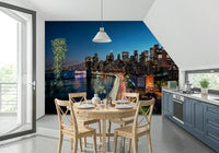 Tall building silhouettes within peel and stick wallpaper.