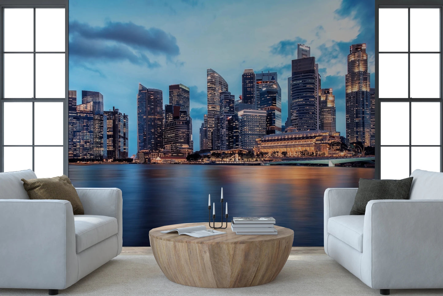 Urban Serenity wallpaper mural of a waterfront skyline under a blue sky behind two white armchairs and a round wood table