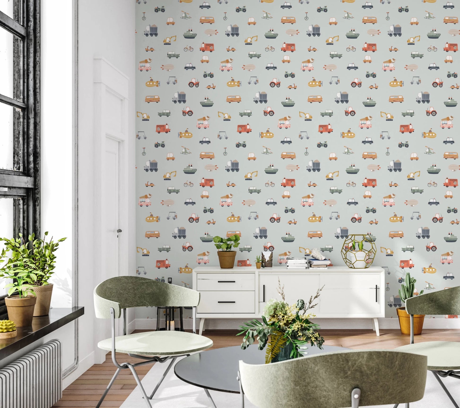 Vehicles in blue background wallpaper behind a white sideboard and green chairs in a loft-window living room