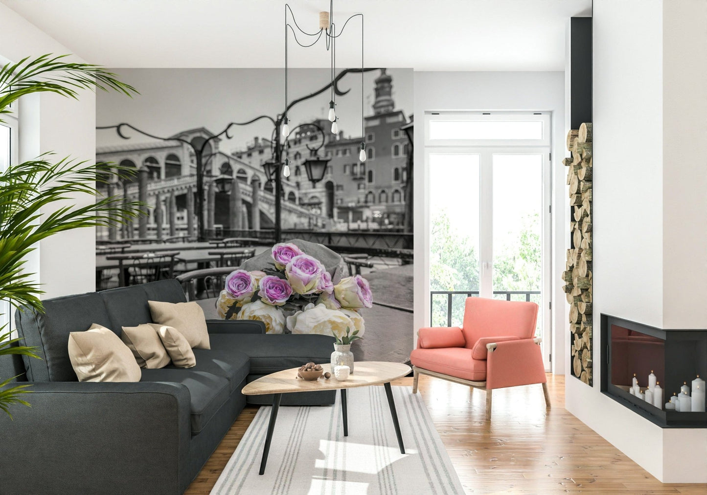 Venetian Blooms wallpaper mural with Venice bridge and roses behind a charcoal sectional sofa and coral armchair in a living room