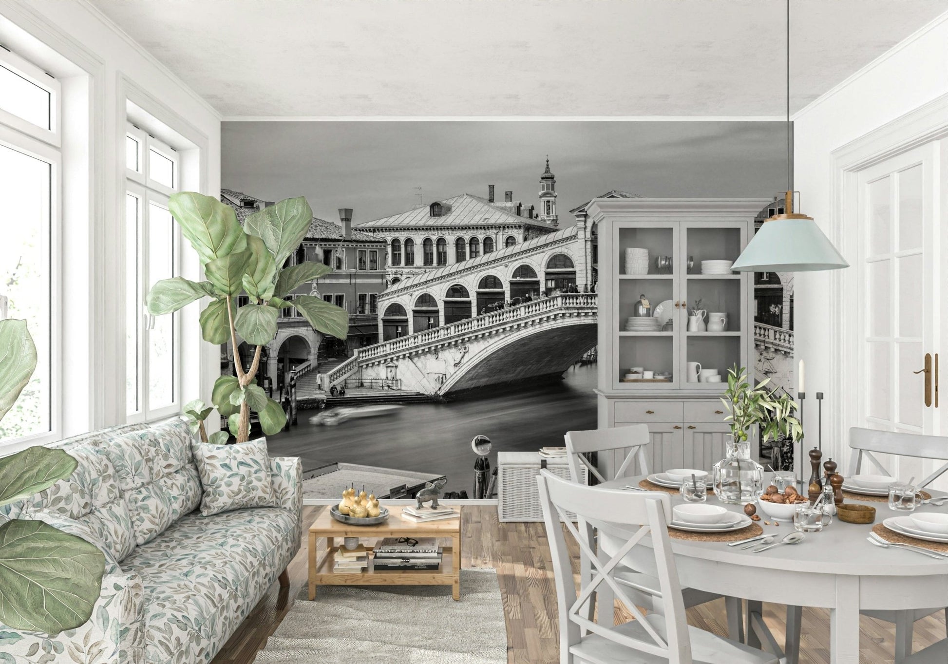 Venetian Bridge Serenity wallpaper mural of the Rialto Bridge behind a floral sofa near a white dining table and hutch