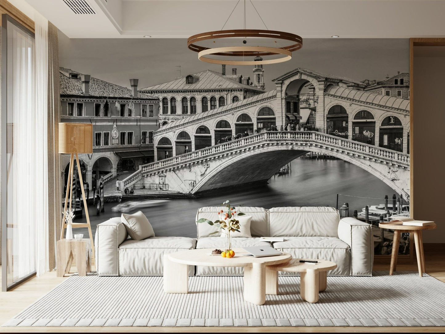 Venetian Bridge Serenity wallpaper mural of Venice's Rialto Bridge in a living room with low cream sofa and round pendant