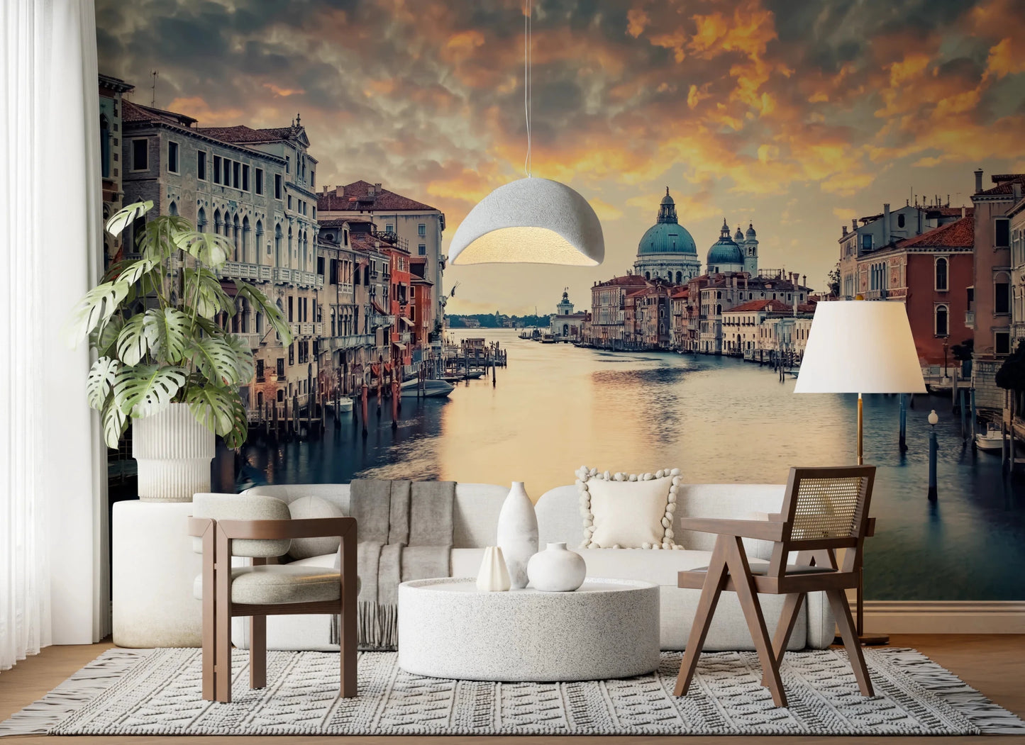 Venetian Twilight wallpaper mural of Venice and its domed basilica behind a cream sofa and dome pendant light
