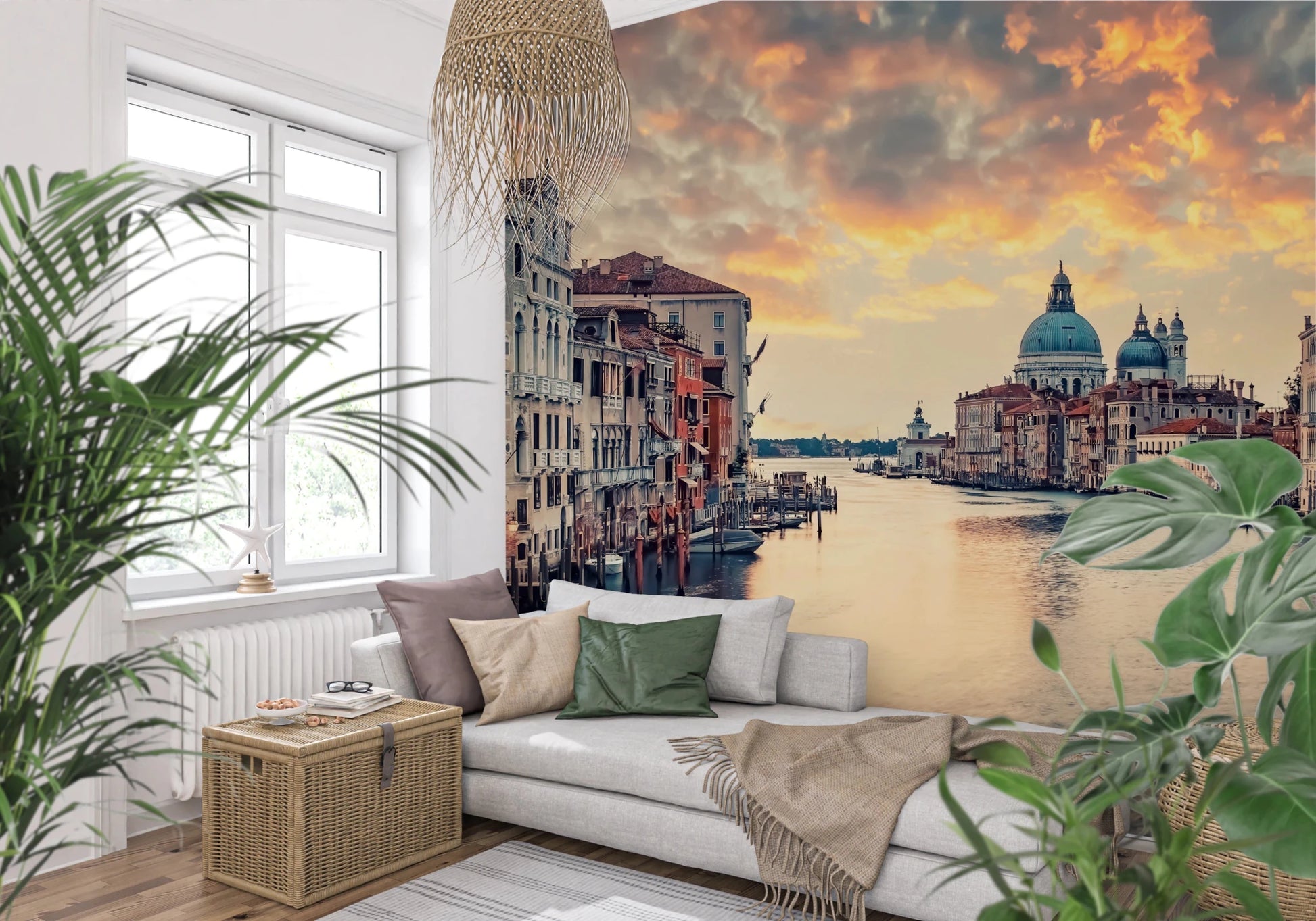 Venetian Twilight wallpaper mural of Venice at dusk beside a window with a white sofa and leafy palms