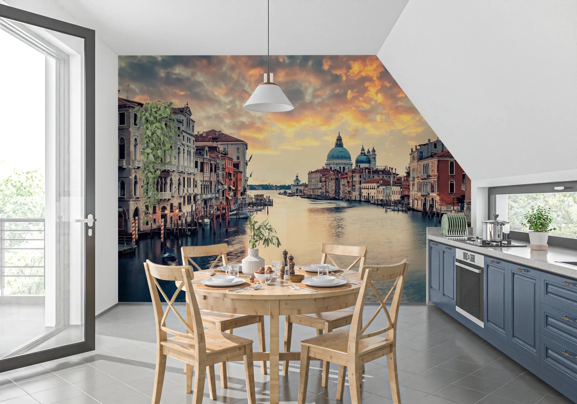 Venetian Twilight wallpaper mural of Venice at sunset in a kitchen diner with a pine table and blue cabinets