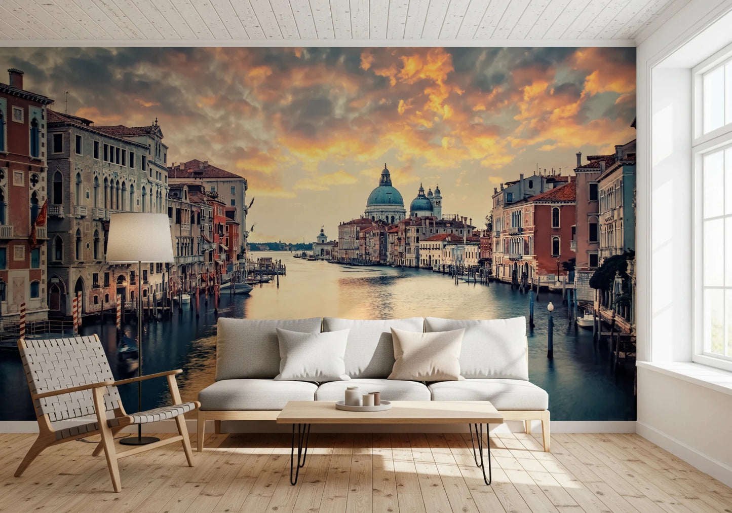 Venetian Twilight wallpaper mural of Venice at dusk behind a white sofa and hairpin-leg coffee table