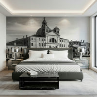Venice Cityscape wallpaper mural of a black and white Venice church behind a dark grey leather bed with white bedding
