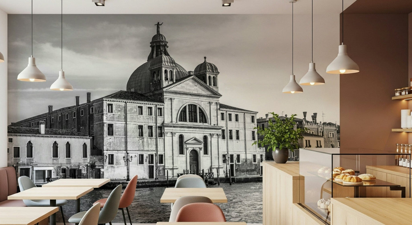 Venice Cityscape wallpaper mural of a black and white Venice church in a cafe with pastel chairs and pastry counter
