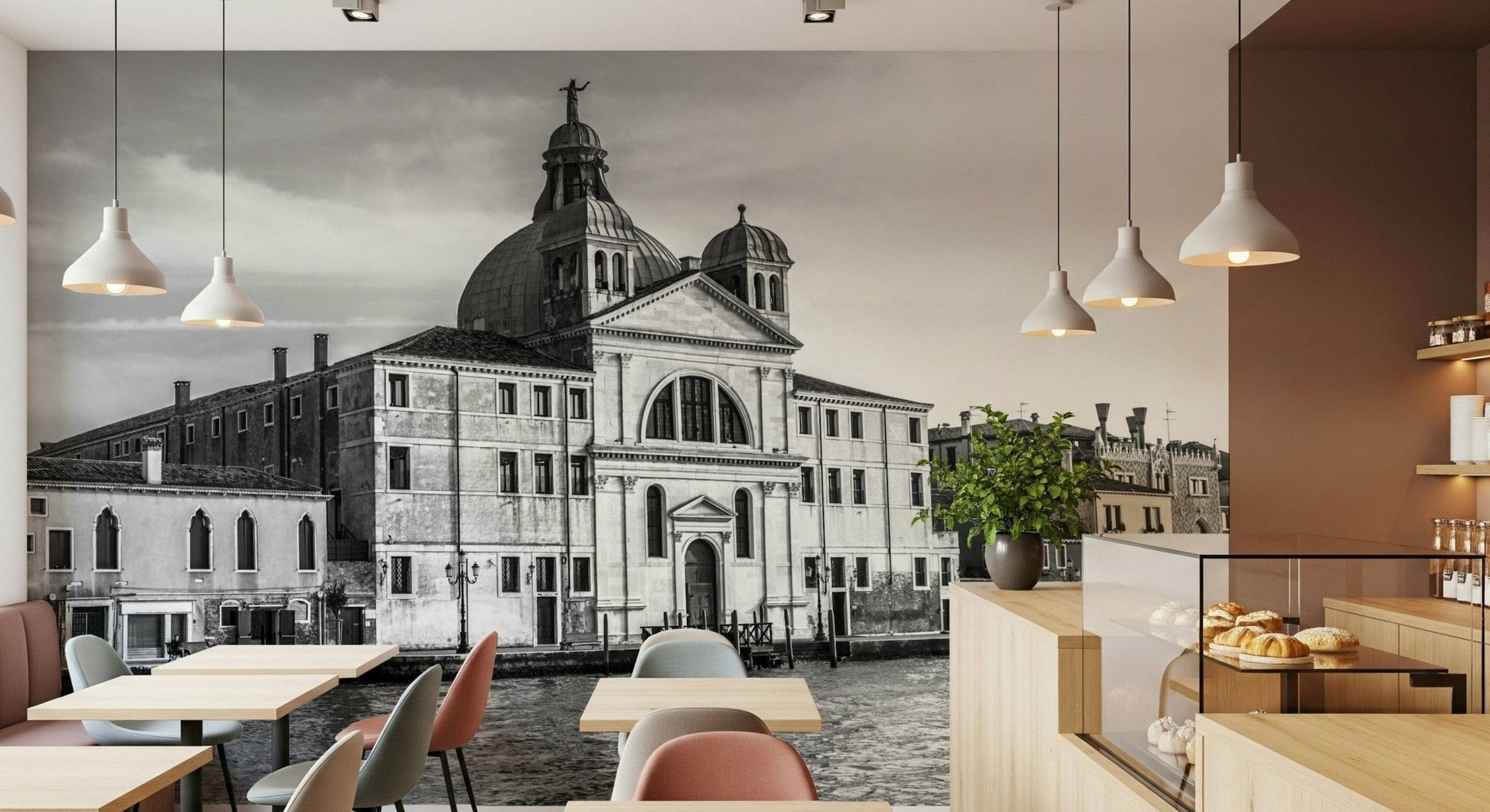 Venice Cityscape wallpaper mural of a black and white Venice church in a cafe with pastel chairs and pastry counter