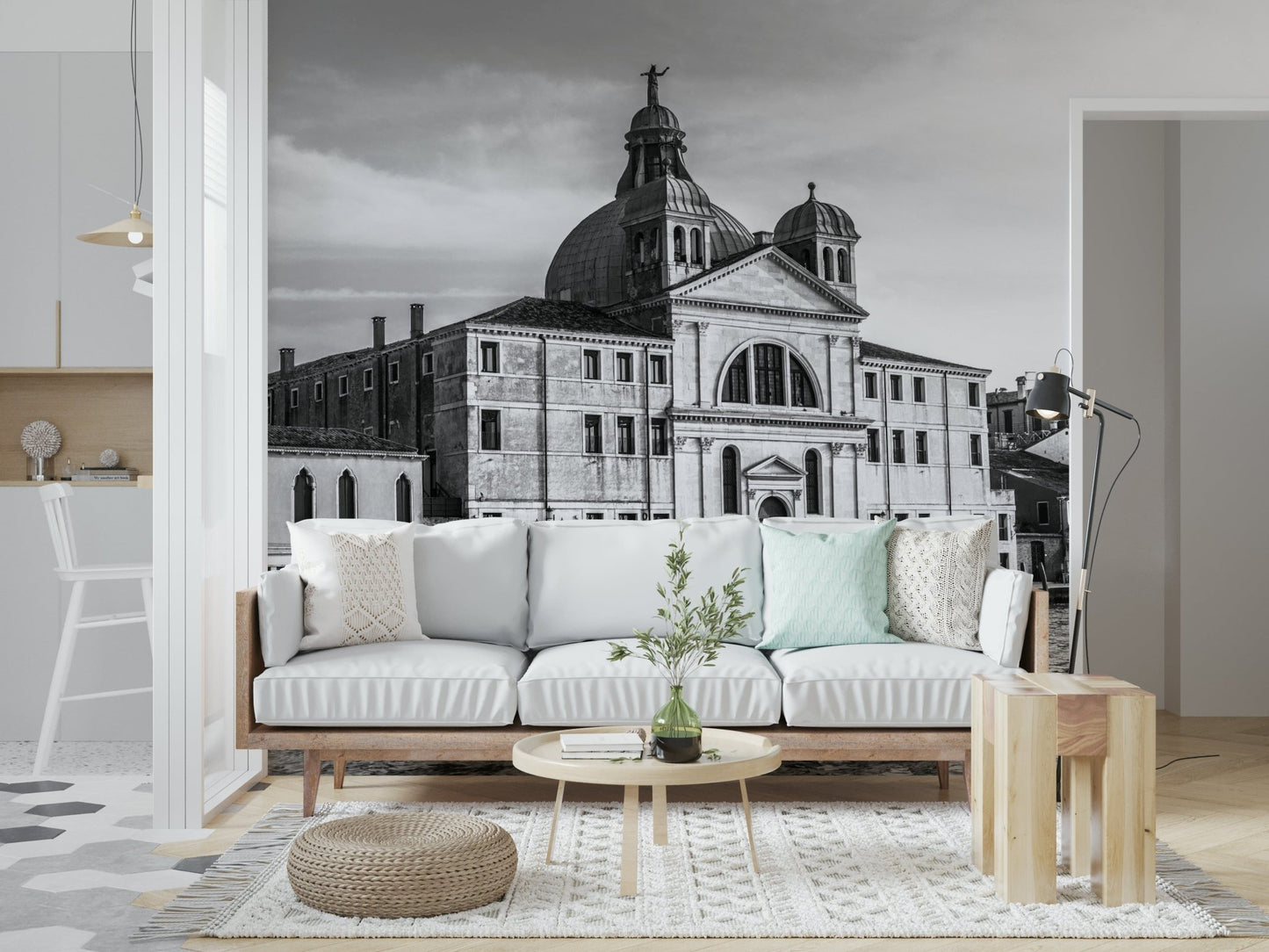 Venice Cityscape wallpaper mural of a grey domed church behind a white sofa with mint pillow and wood side table