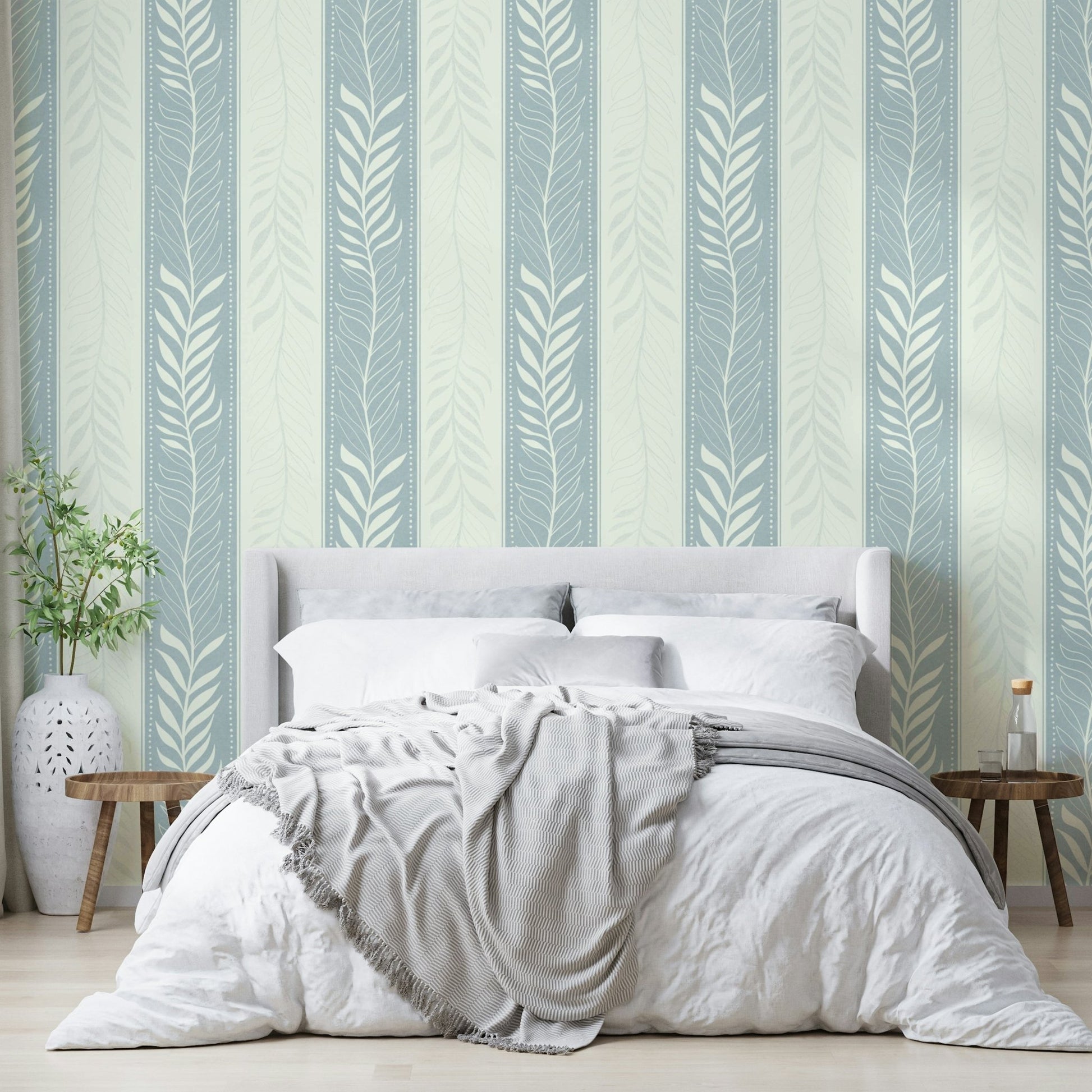 Nature-inspired wallpaper featuring vertical leaves and stems

