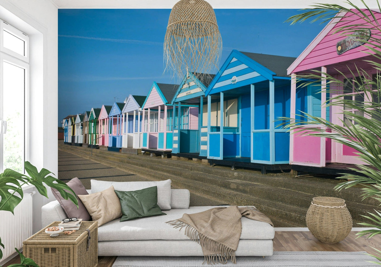 Seafront huts wall mural with blue sky