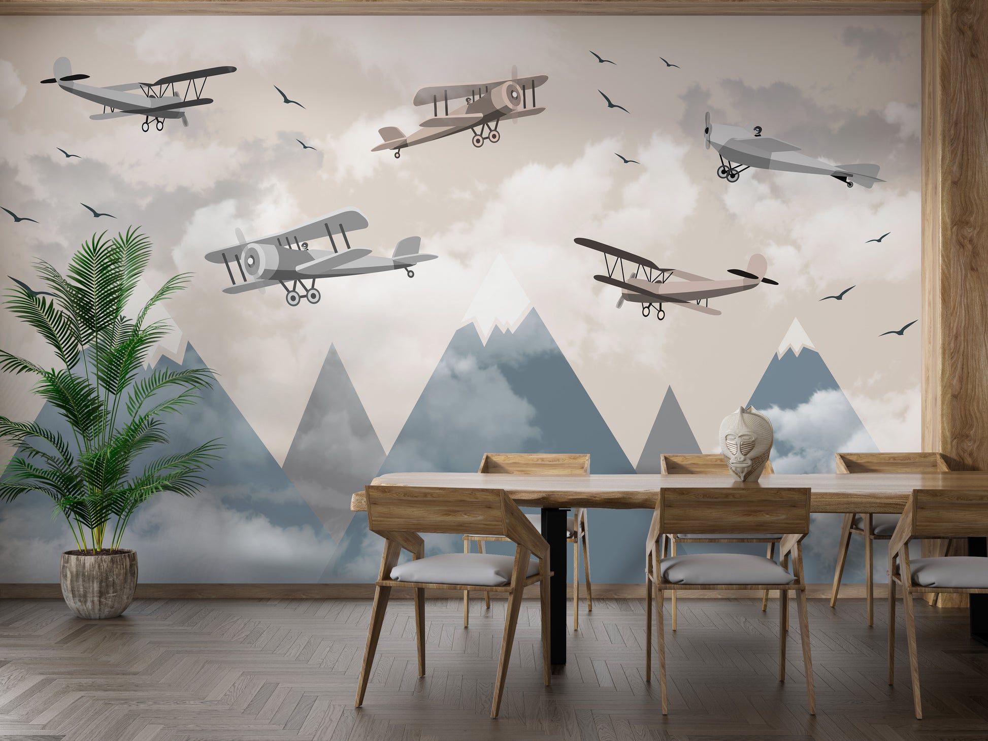 Vintage Aircraft wallpaper mural with biplanes over misty blue peaks behind a wooden dining table