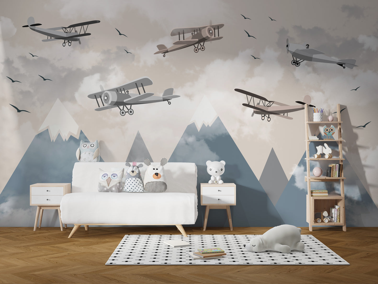 Vintage Aircraft wallpaper mural with grey biplanes over blue mountains above a white kids sofa