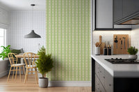 Vintage Bloom Rows wallpaper mural in a kitchen with a white tile breakfast nook and potted plant, green stripes