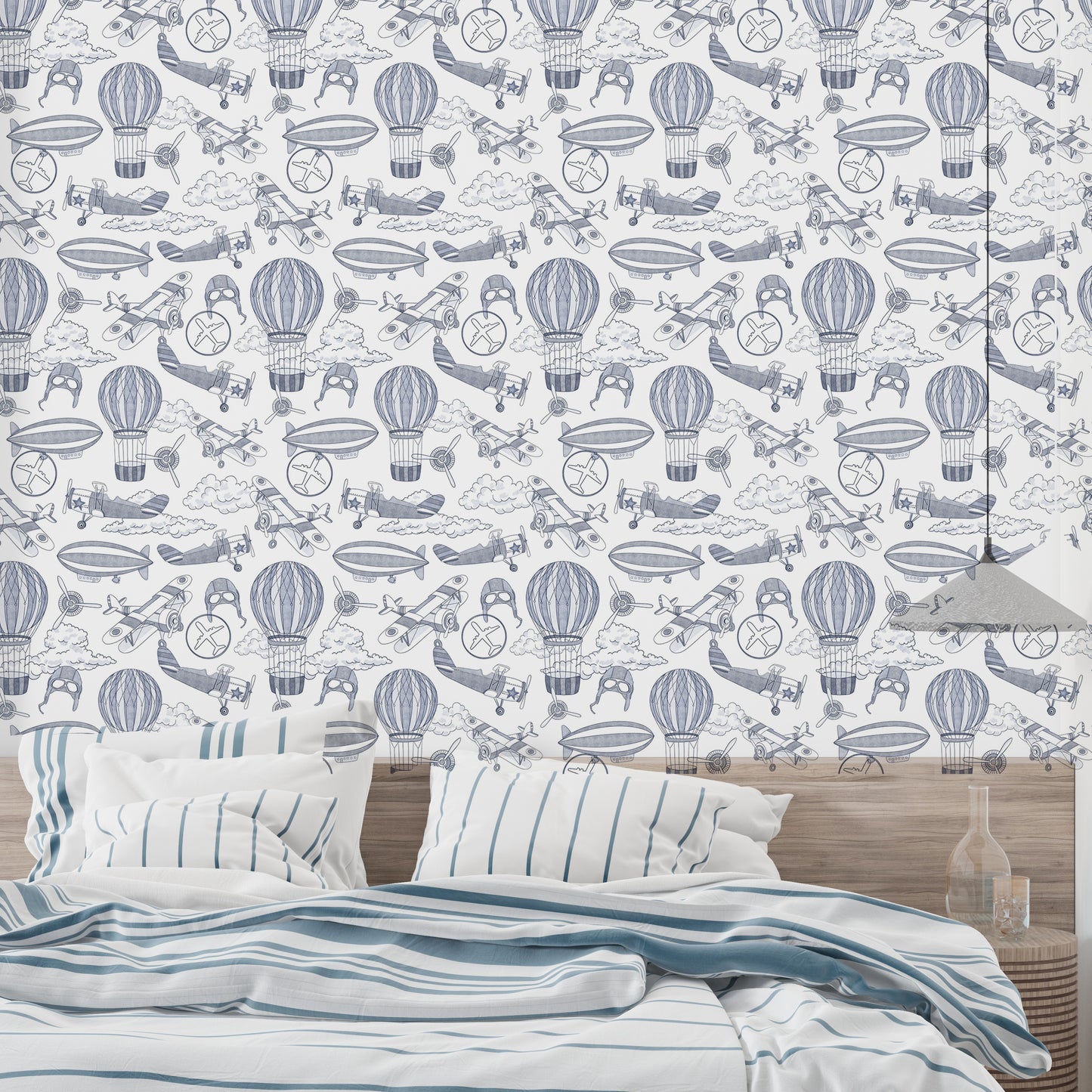 Soft blue wallpaper featuring old-fashioned airplanes


