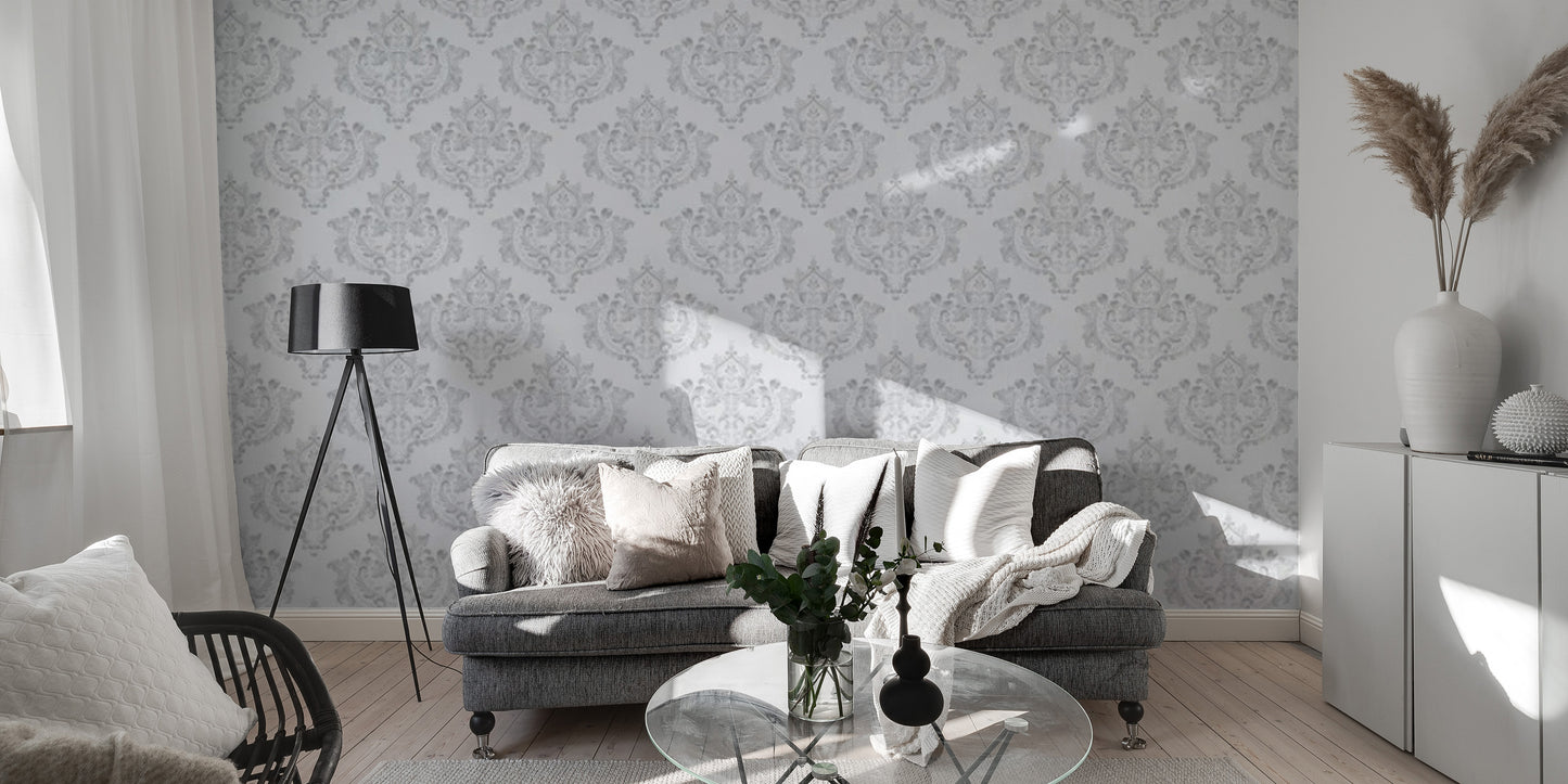 Subtle grey damask repeat wallpaper on a white backdrop.