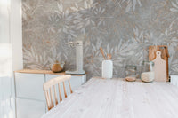 Vintage Floral Artwork wallpaper mural with grey leaves in a kitchen behind a pale-wood counter