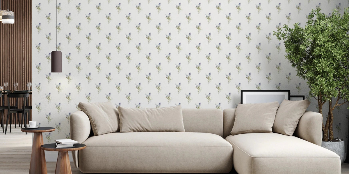 Vintage Floral Whispers wallpaper mural in a living room with a beige sectional sofa and indoor tree