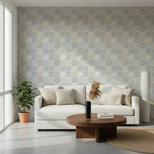 Vintage Folk Tiles Blue Breeze wallpaper behind a white curved sofa and round walnut table in a living room