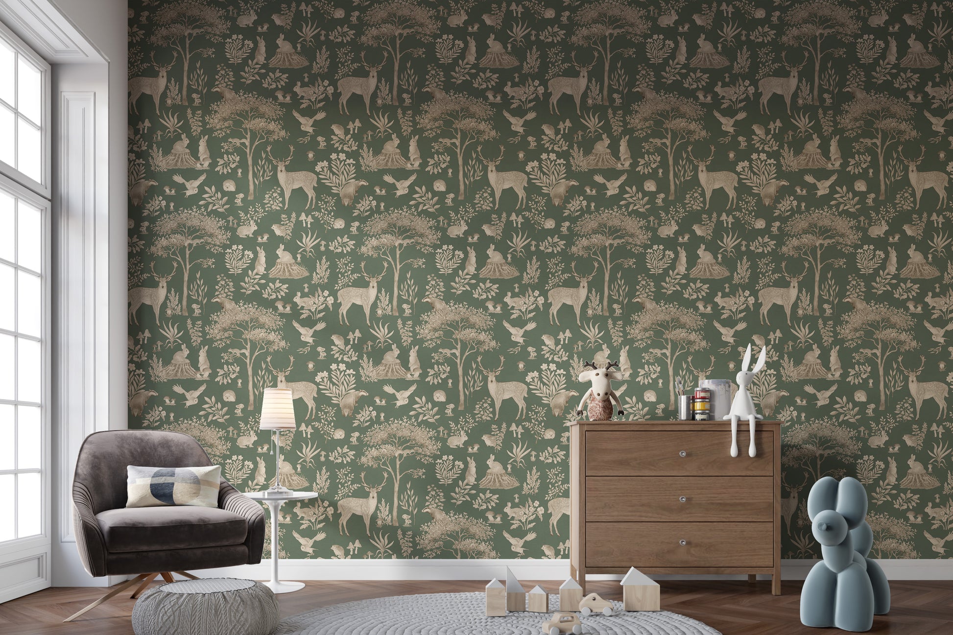 Vintage Green Wildlife wallpaper in a living room with a brown velvet armchair and wooden dresser