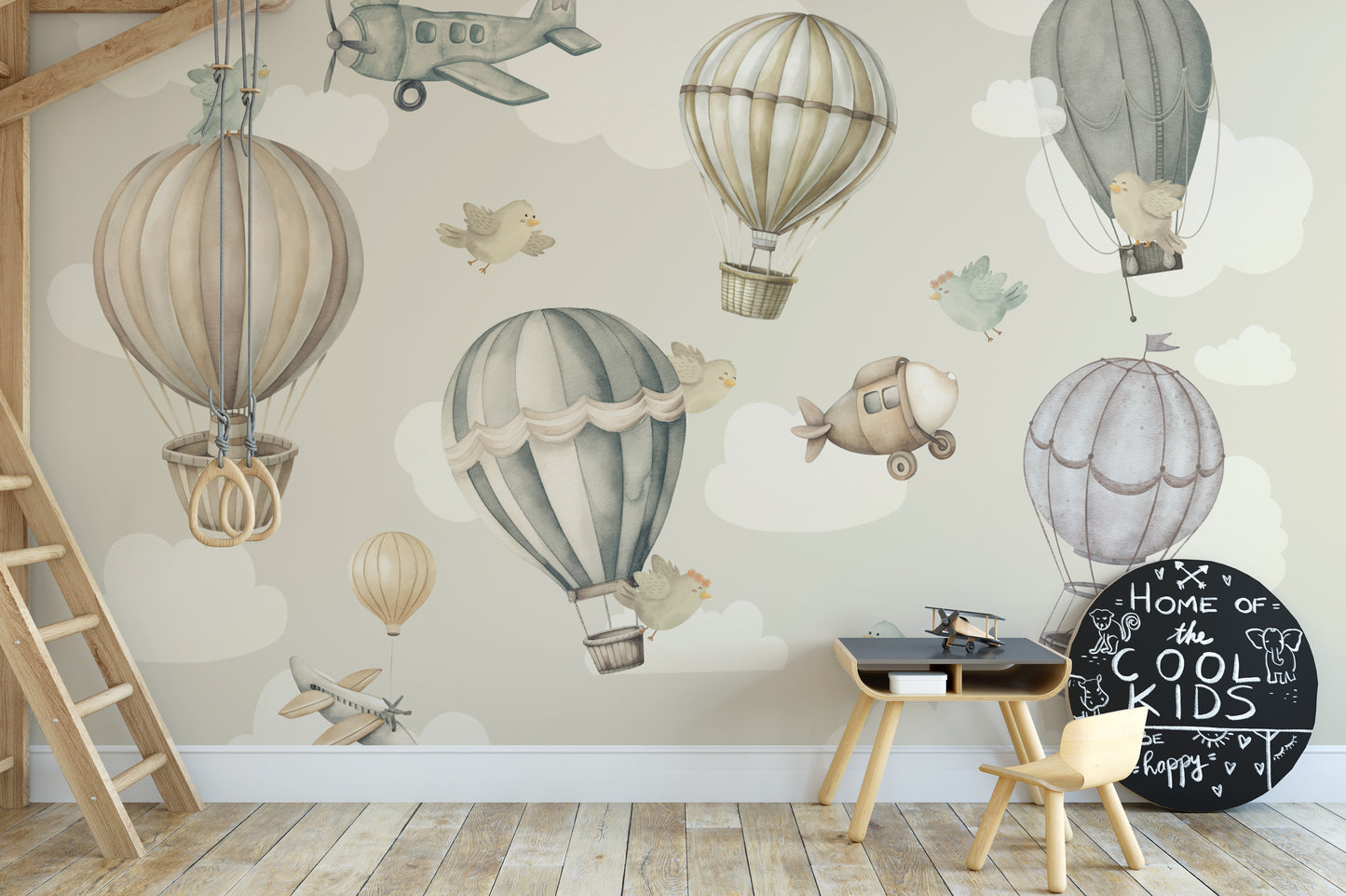 Vintage Hot Air Balloon Nursery wallpaper mural of balloons by a wooden loft-bed ladder and round chalkboard