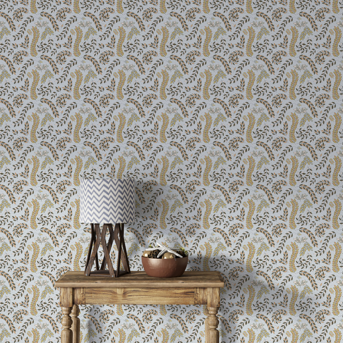 Vintage Foliage Golden and Gray wallpaper above a wooden console with chevron lamp in an entryway